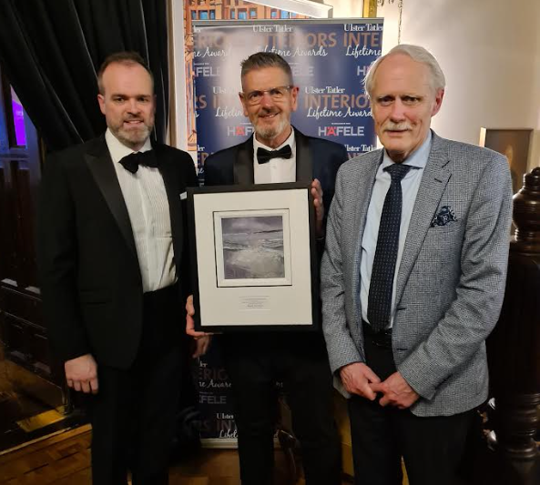 Ronnie McCulloch Director and Retail manager at Daniel George Kitchens wins 2024 Lifetime Achievement Award. Pictured along with Jonathan Orr and Willy George